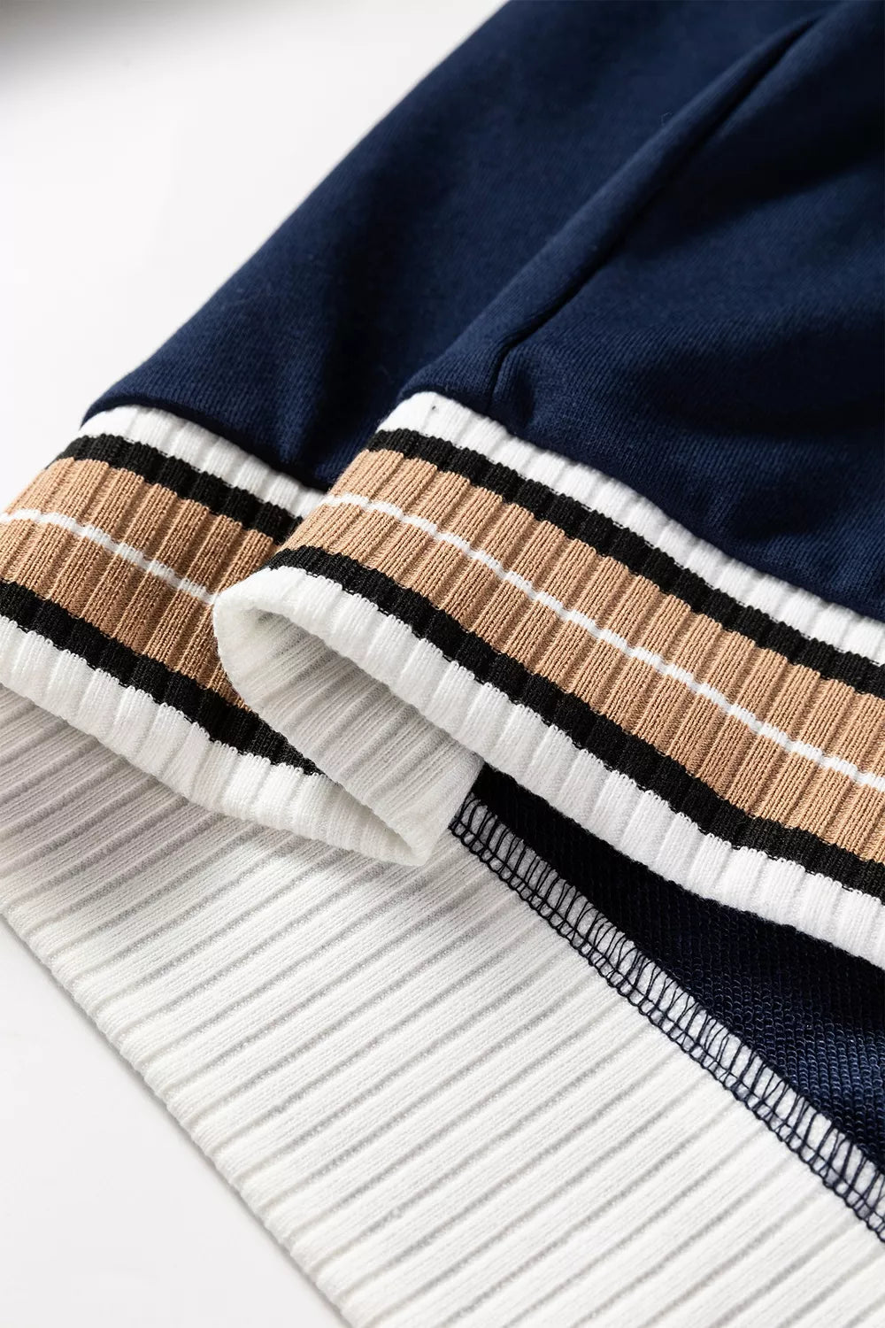 Contrast striped trim V-neck sweatshirt from Trendsi featuring a cozy fit and stylish design in a casual, comfortable style.