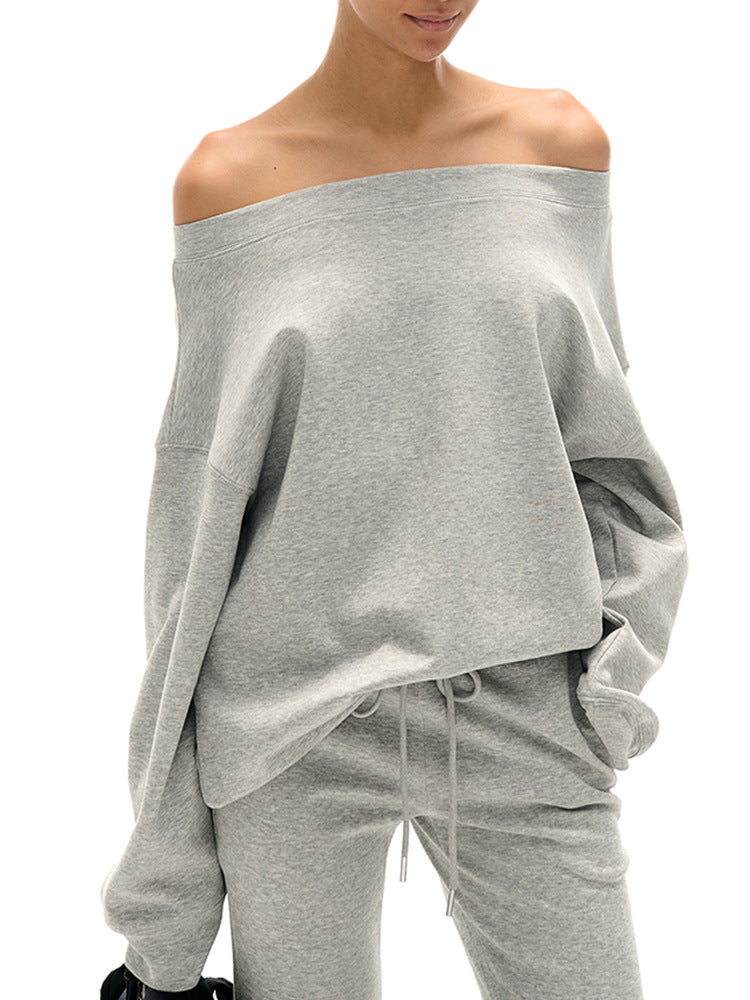 Plush Fashion Hub outfit set with a shoulder cut-out crop top and matching flared sweatpants, casual and stylish women's clothing.