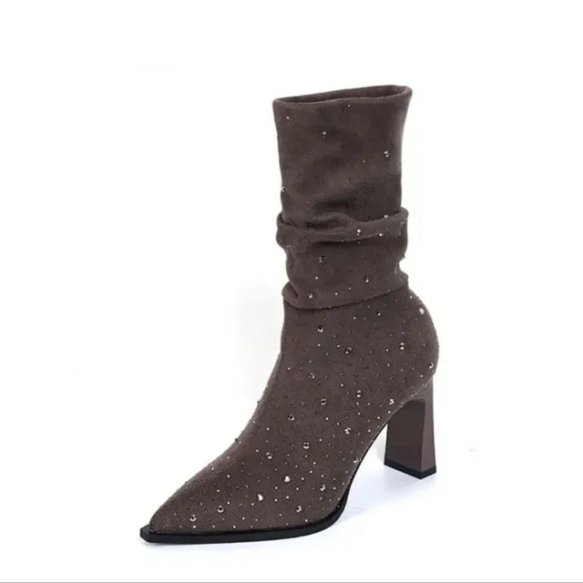 Brown suede mid-calf slouch boot with rhinestone embellishments, pointed toe, and block heel.
