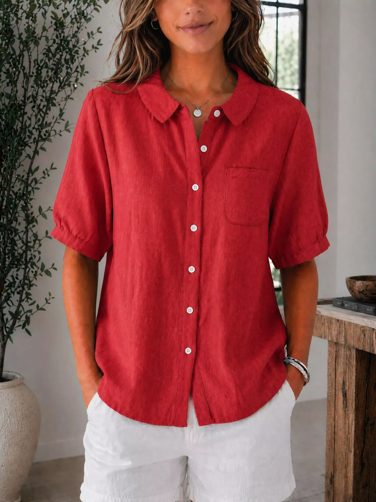 Plus size short sleeve button-up shirt from Trendsi, featuring a full-size, stylish top with a collared neckline and front buttons.