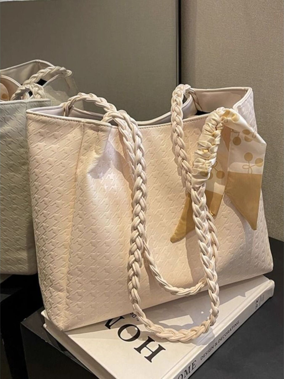 Plush Fashion Hub braided handle tote bag in neutral tones, featuring woven handles and spacious interior for everyday use.