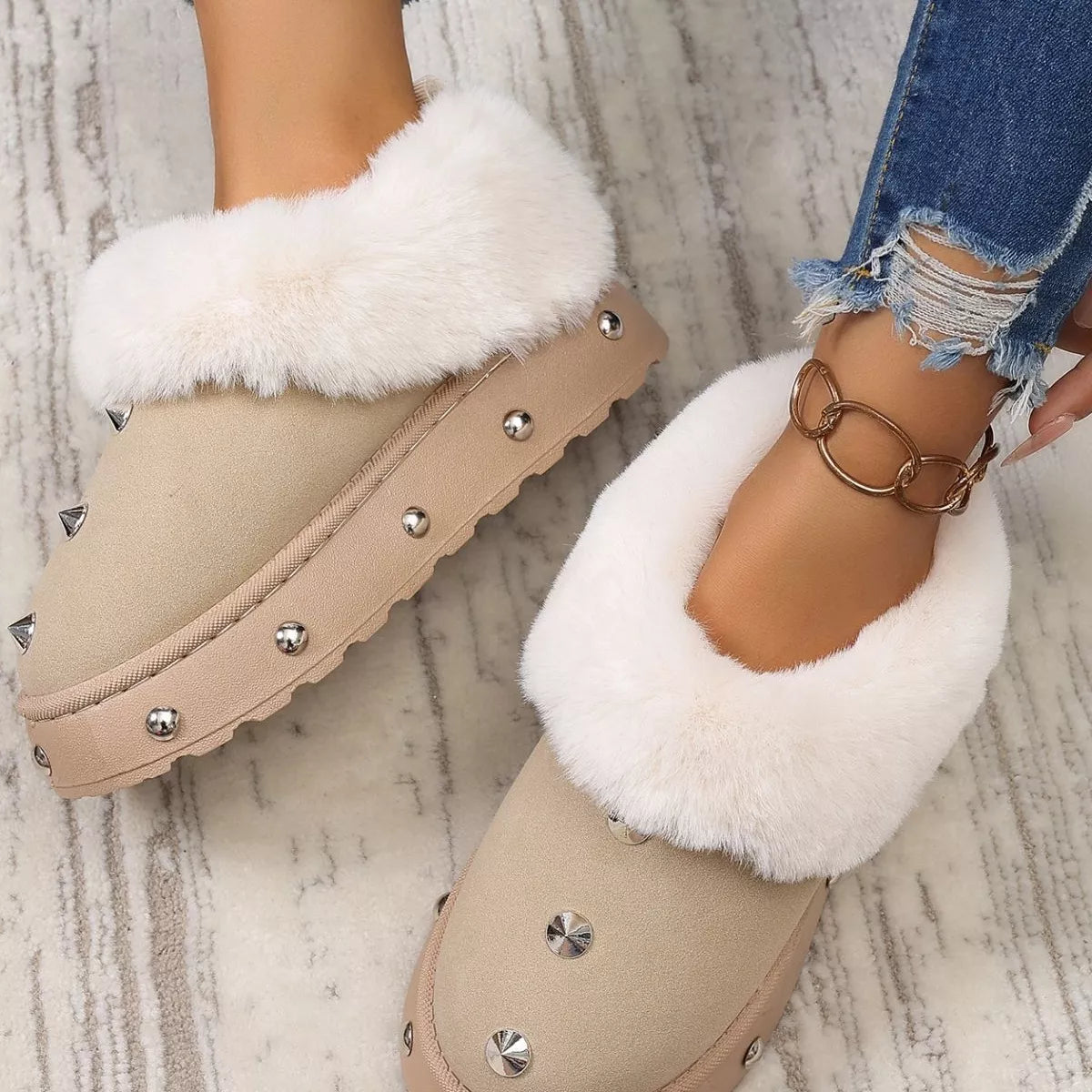 Trendsi studded platform winter boots with faux fur lining, featuring a rugged sole and decorative metal studs for cold weather style.