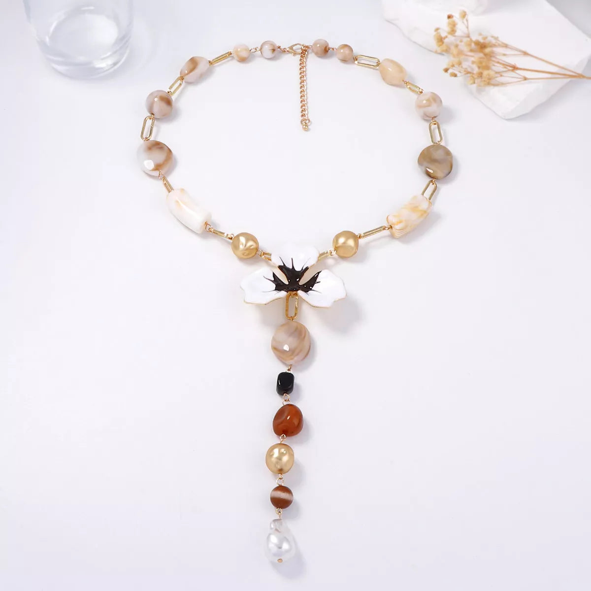 Y-shaped alloy necklace with dripping oil flower resin pendant, stylish jewelry piece from Plush Fashion Hub for women.