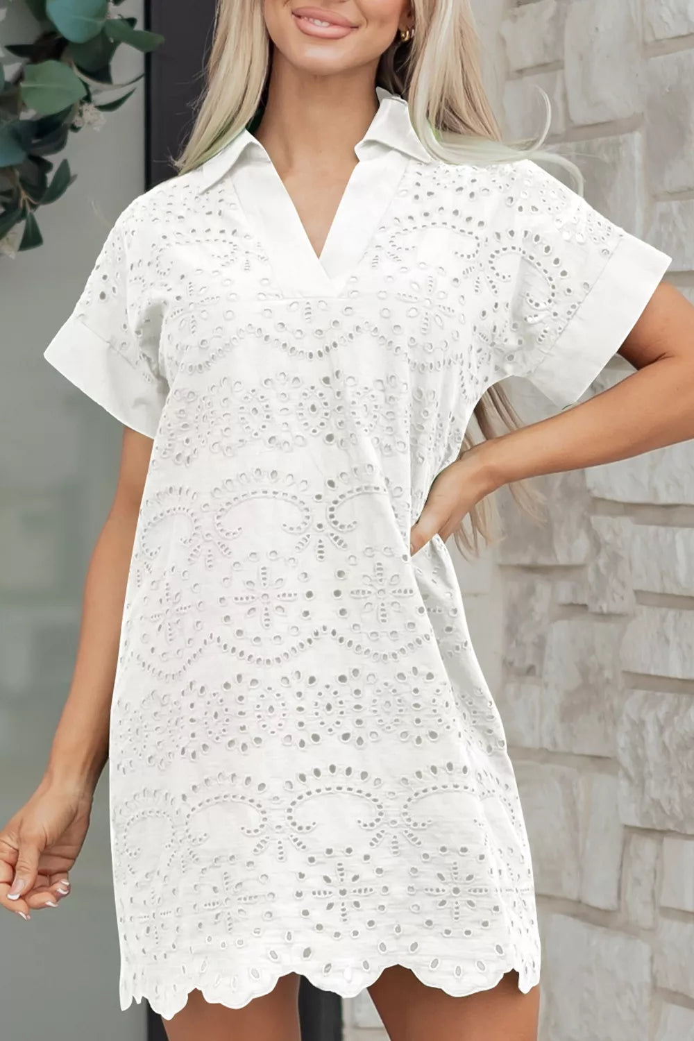 Solid color eyelet embroidered mini dress from Plush Fashion Hub featuring eyelet details and a fitted silhouette.