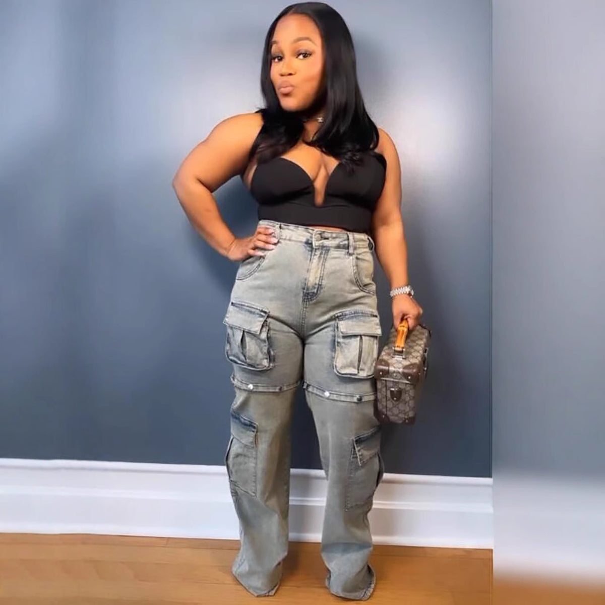 Women's denim pants with multiple pockets and detachable buttons, straight leg casual jeans by eprolo, shown in the image.