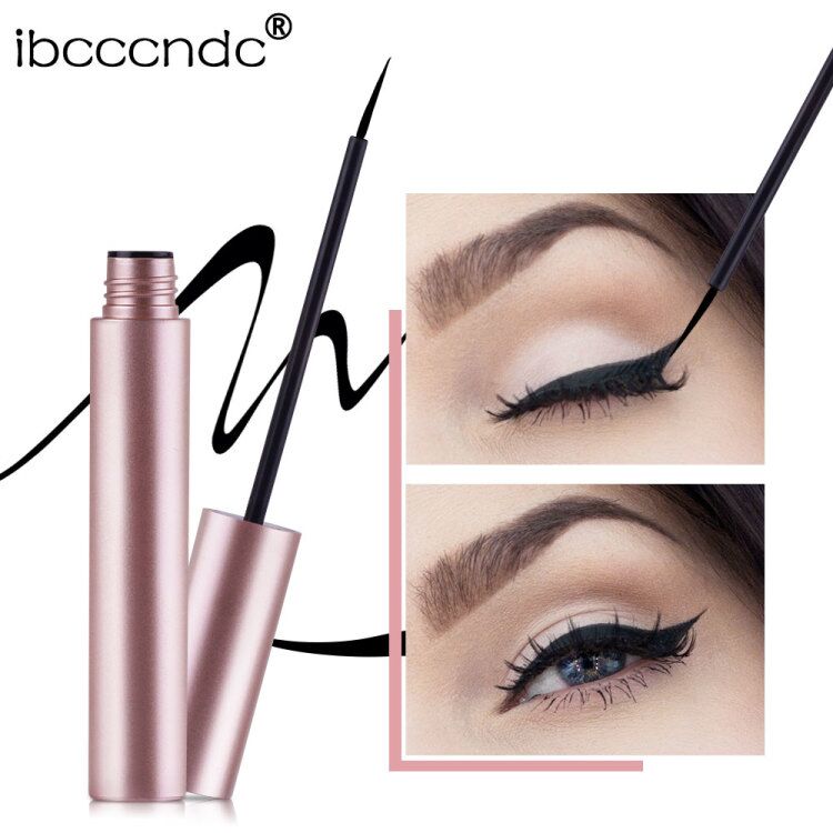 Metallic pink liquid eyeliner bottle with fine brush applicator and black strokes shown applied to an eye.