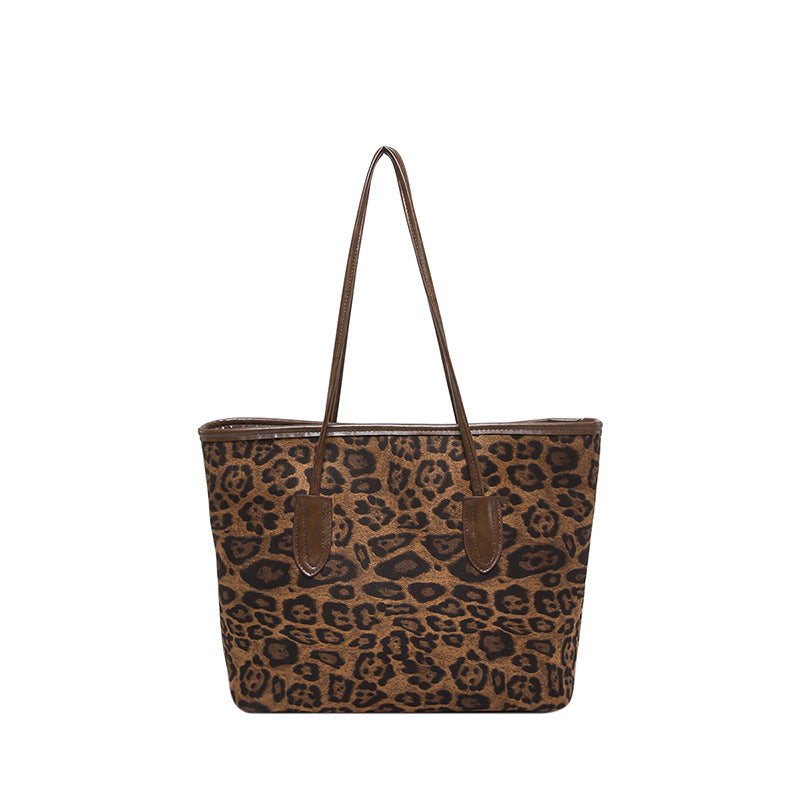 Women's large-capacity leopard-print PU leather shoulder and hand bag by Plush Fashion Hub, with stylish design and spacious interior.