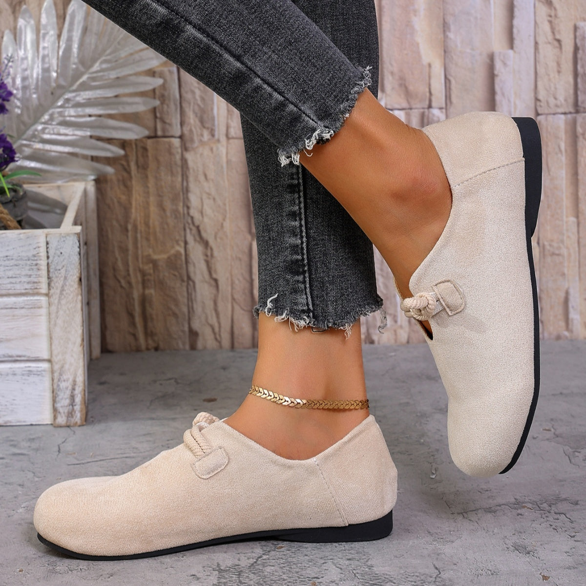 Trendsi round toe slip-on footwear showing a comfortable, casual shoe with a sleek design and neutral color.