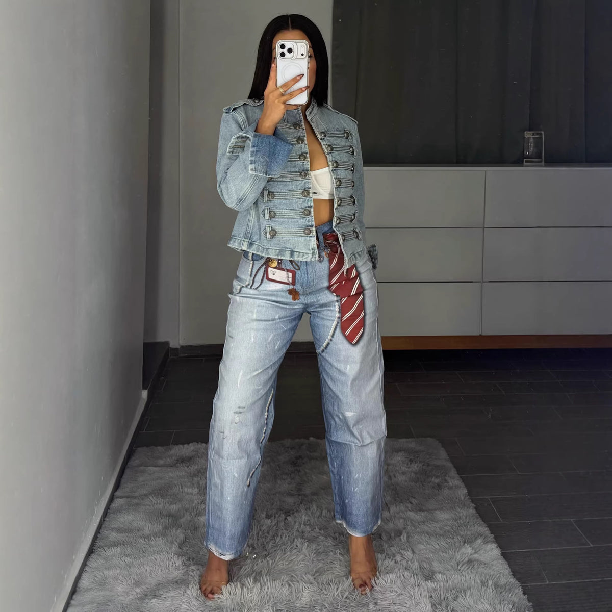 Street style badge print dagger jeans by Plush Fashion Hub, showcasing distressed denim with bold badge and dagger graphic details.