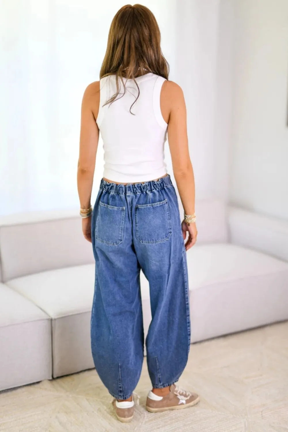 Plush Fashion Hub drawstring denim jeans with front and back pockets, casual style, blue wash, and comfortable fit.