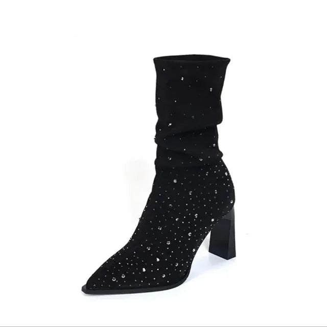 Black suede heeled boot with a pointed toe, slouchy shaft, and scattered silver rhinestone embellishments.