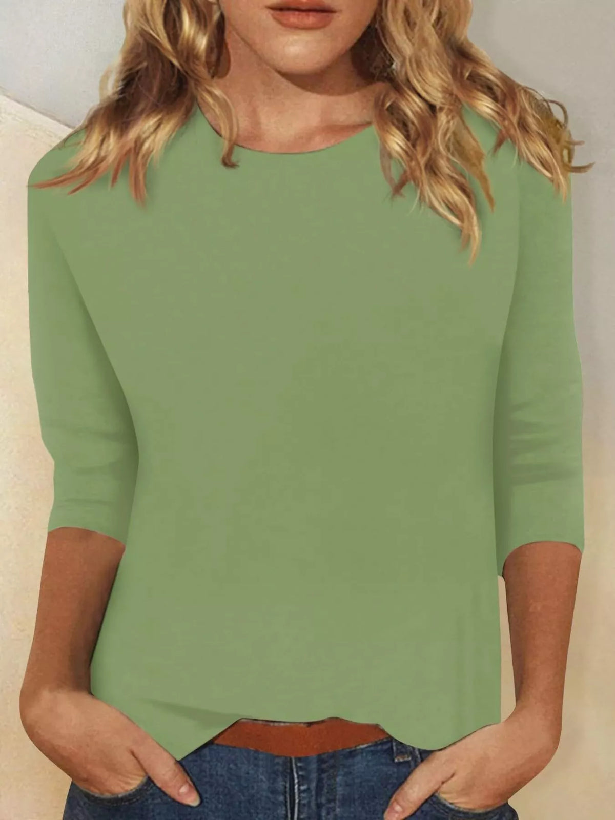 Solid color round neck T-shirt from Plush Fashion Hub, lightweight cotton fabric, casual style, displayed on a plain background.