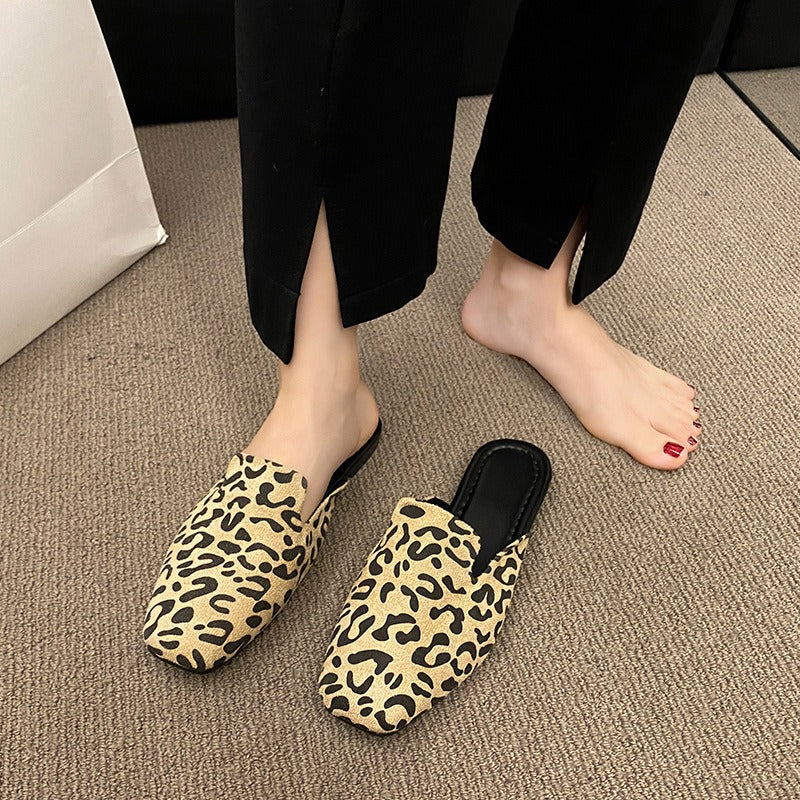 Leopard print pointed toe slippers from Plush Fashion Hub, stylish and comfortable mules with animal pattern design.