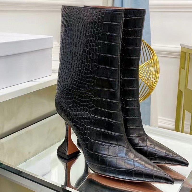 Black crocodile-embossed leather mid-calf boots with pointed toes and flared stiletto heels.