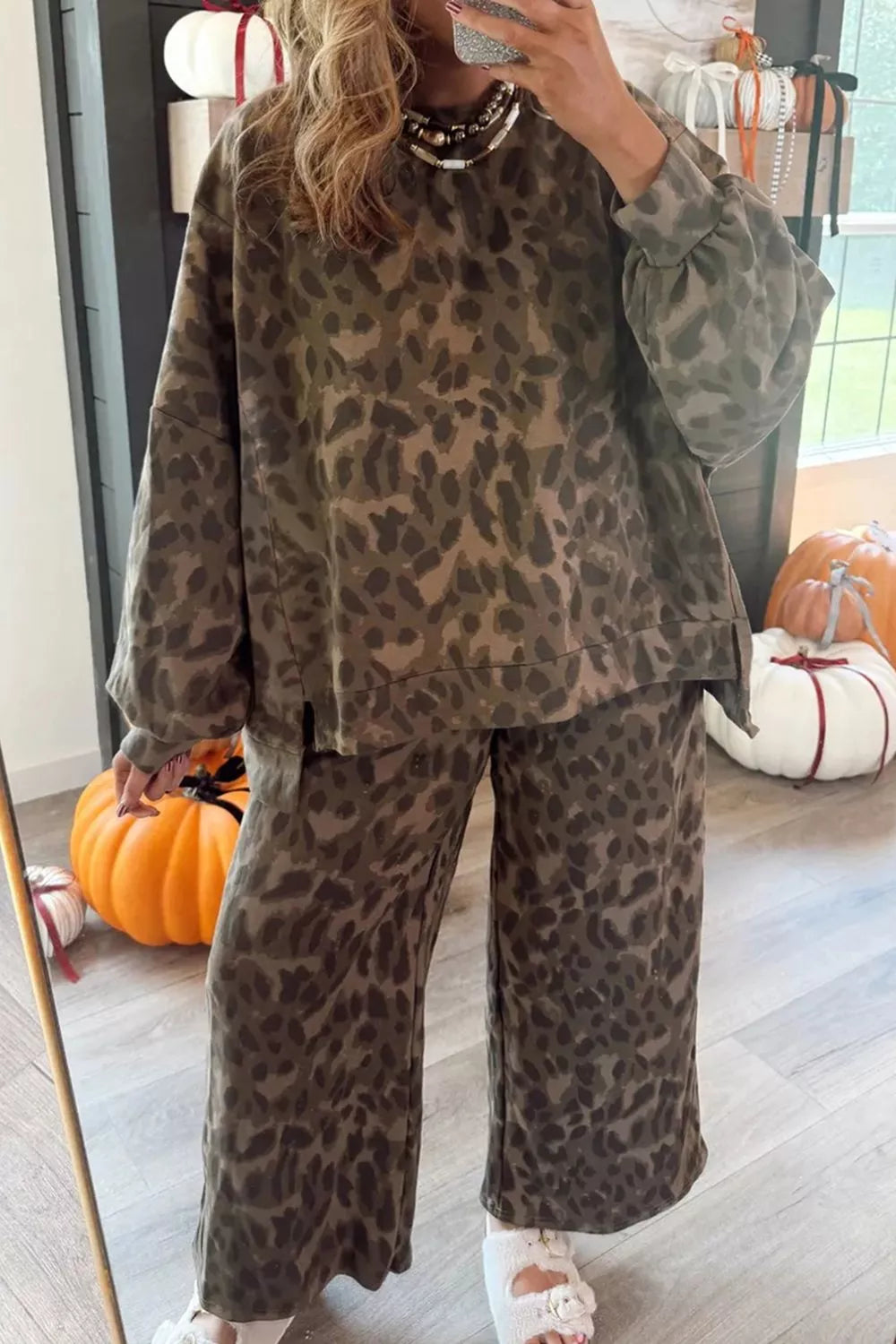 Leopard print long sleeve top and matching pants set by Trendsi, stylish animal print loungewear on a model.