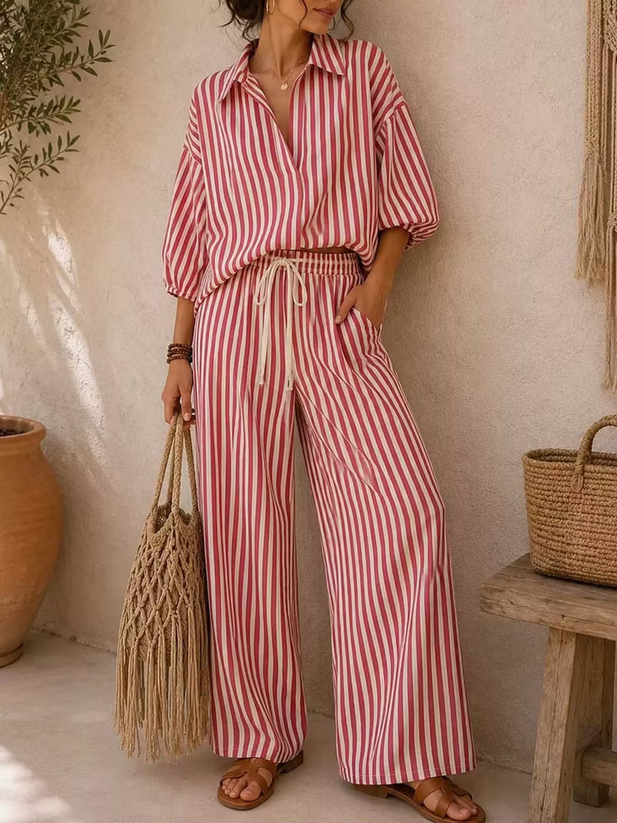 Plus size striped puff sleeve shirt and wide-leg drawstring pants set by Trendsi, casual stylish matching outfit for women.