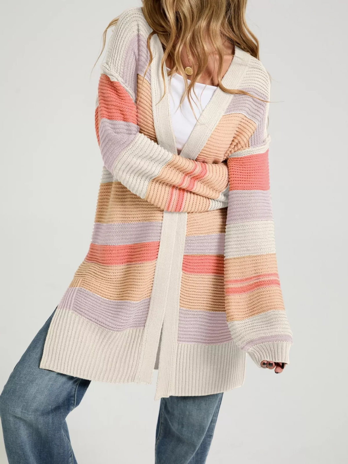 Color block striped open front cardigan from Trendsi, featuring vibrant horizontal stripes and a relaxed fit.