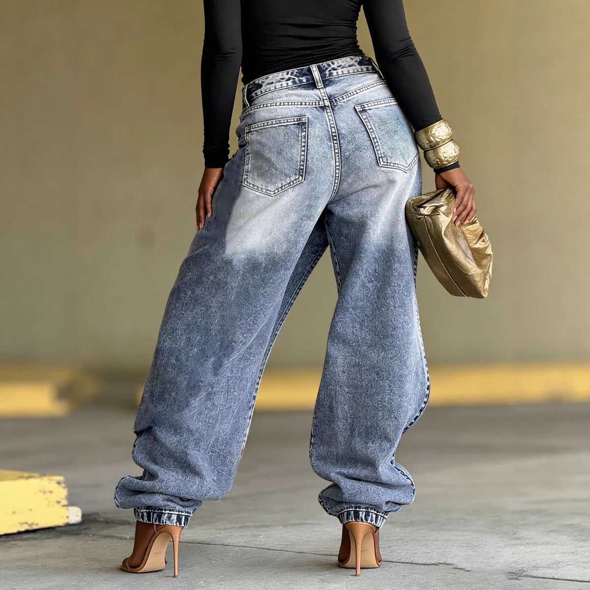 Deconstructed patchwork layered washed denim pants by Plush Fashion Hub featuring distressed and multi-tone denim details.