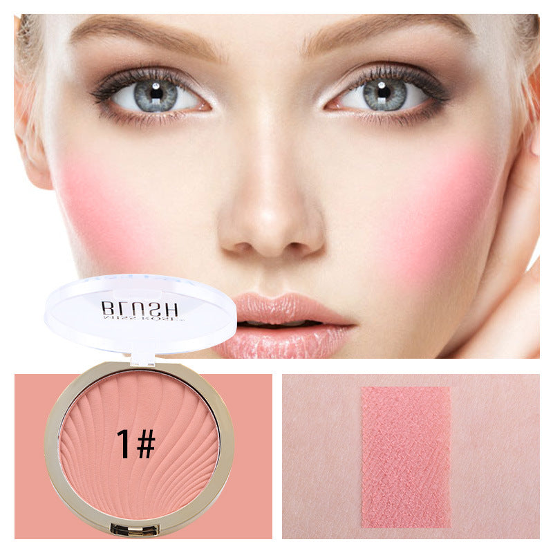 Pink powder blush compact with a wavy pattern, featuring shade 1#, shown on a model’s cheeks and arm swatch.