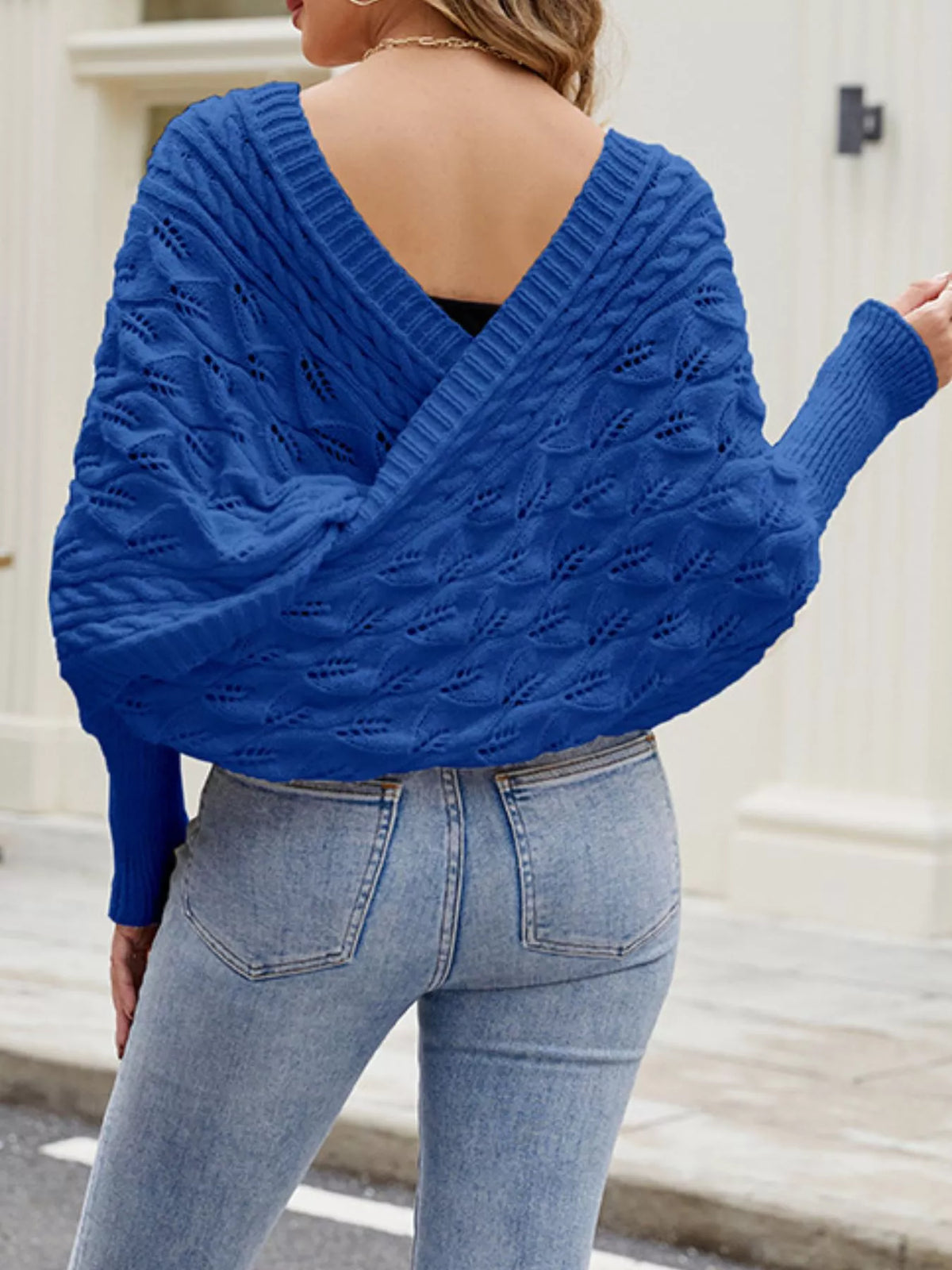 Cable knit batwing sleeve sweater from Plush Fashion Hub, shown in a cozy, textured knit with wide sleeves and classic design.