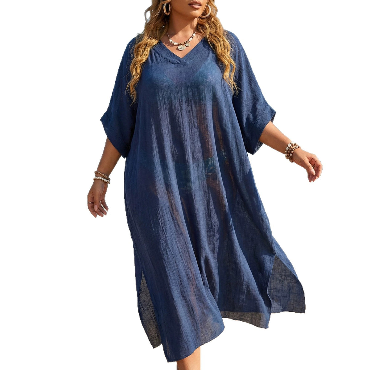 Blue textured linen beach cover-up with V-neck, short sleeves, side slits, and relaxed fit.