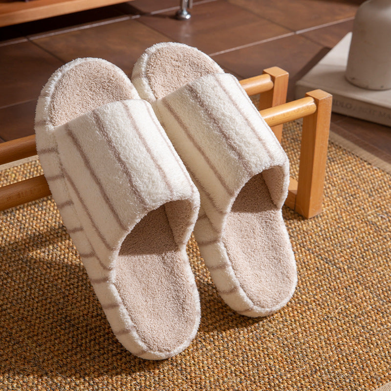 Unisex plush faux fur indoor slippers with anti-slip soles, comfortable home footwear from Plush Fashion Hub.
