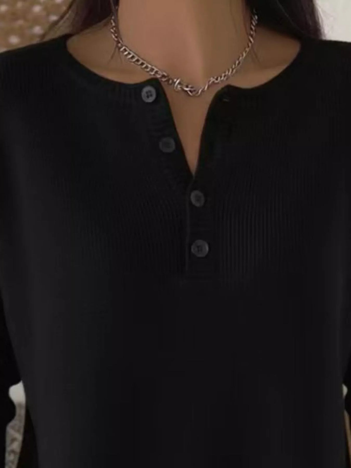 Plus size ribbed knit sweater with button details, featuring a cozy, fitted design from Trendsi.