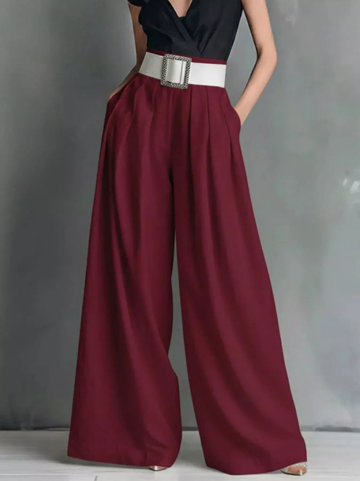 High-waisted wide-leg pants from Plush Fashion Hub displayed on a model, showcasing relaxed fit and stylish design.