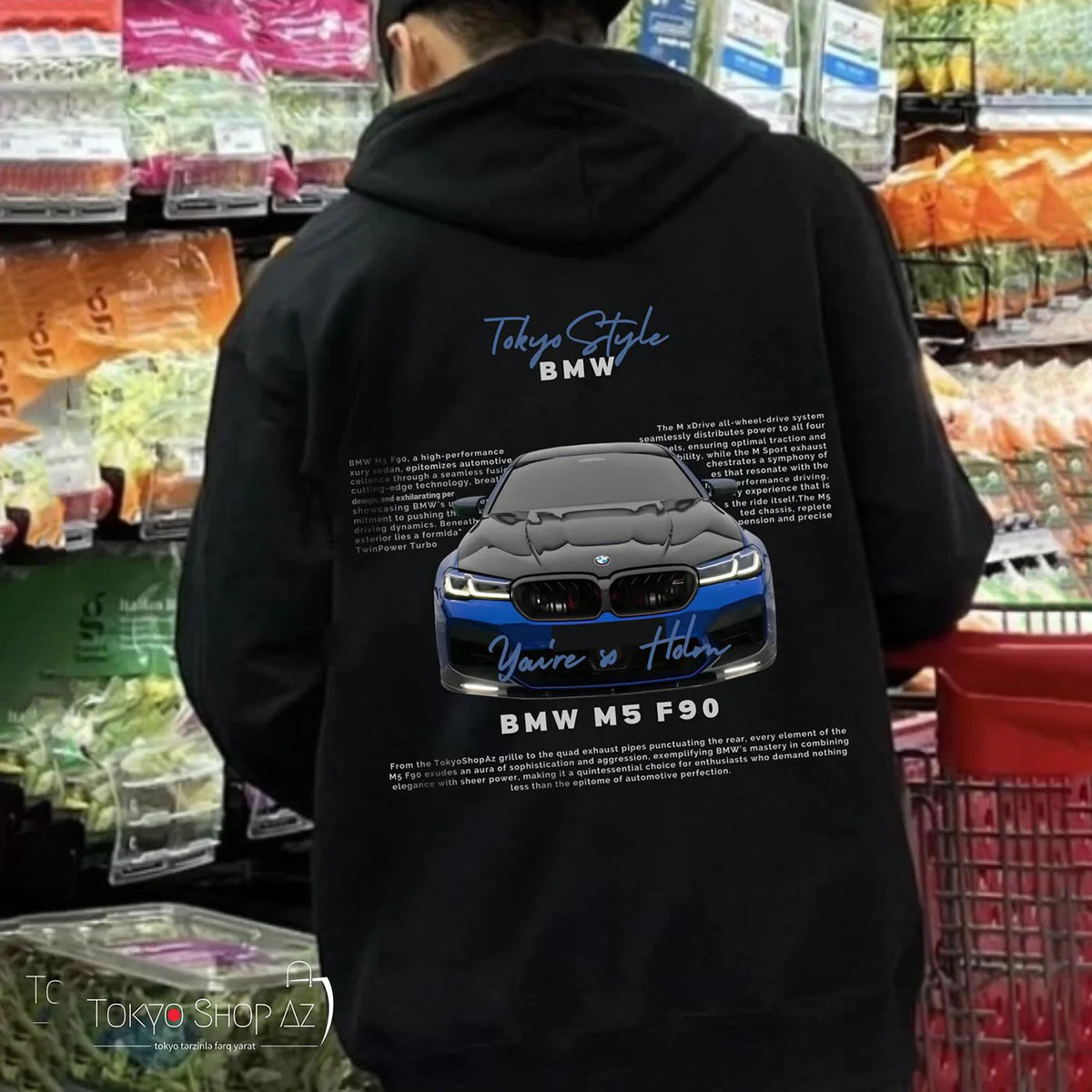 A black long-sleeve hoodie featuring a blue car graphic and text print on the back.