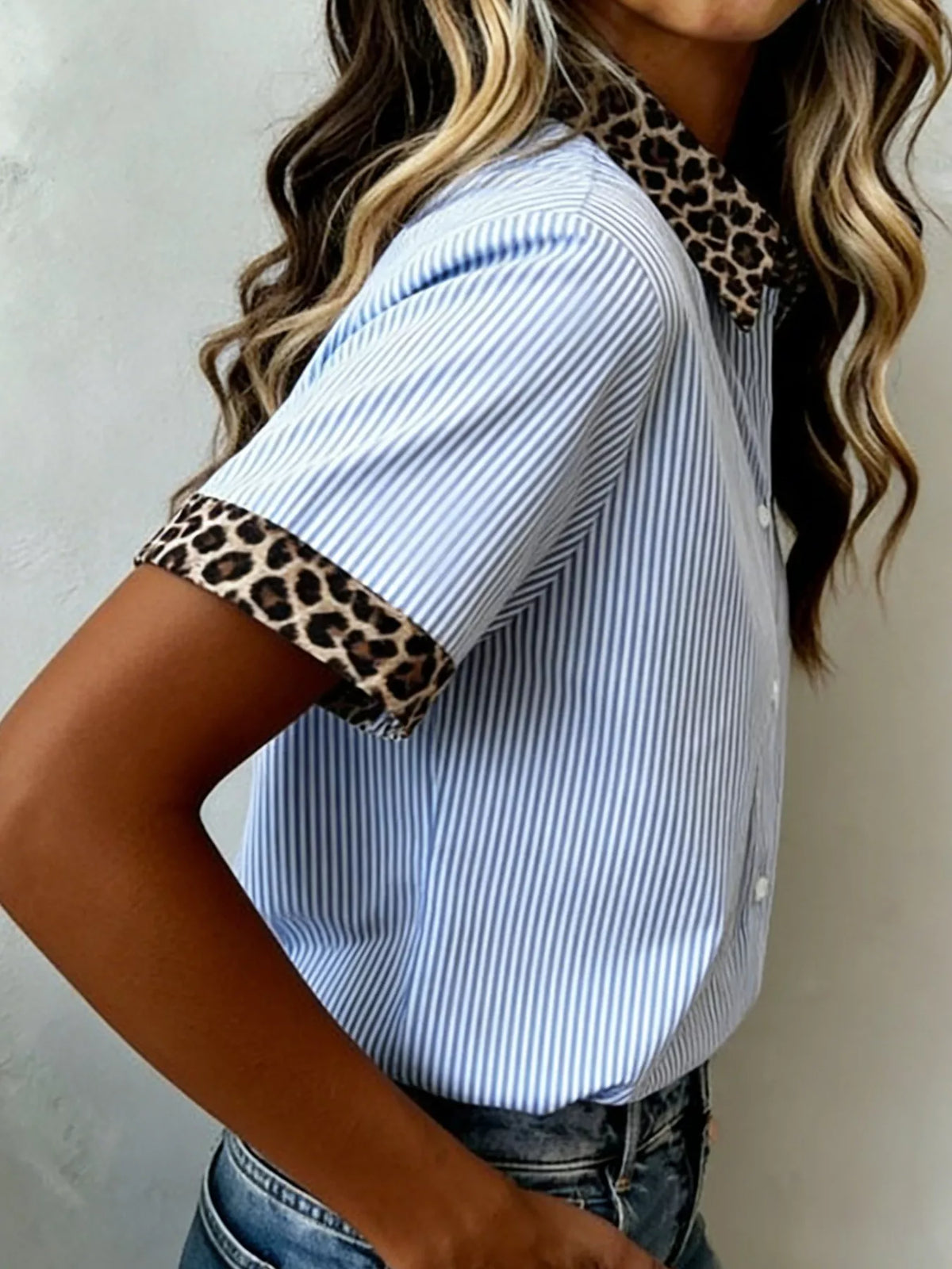 Women's leopard print short sleeve dress with contrast collar by Plush Fashion Hub, featuring a stylish and comfortable design.
