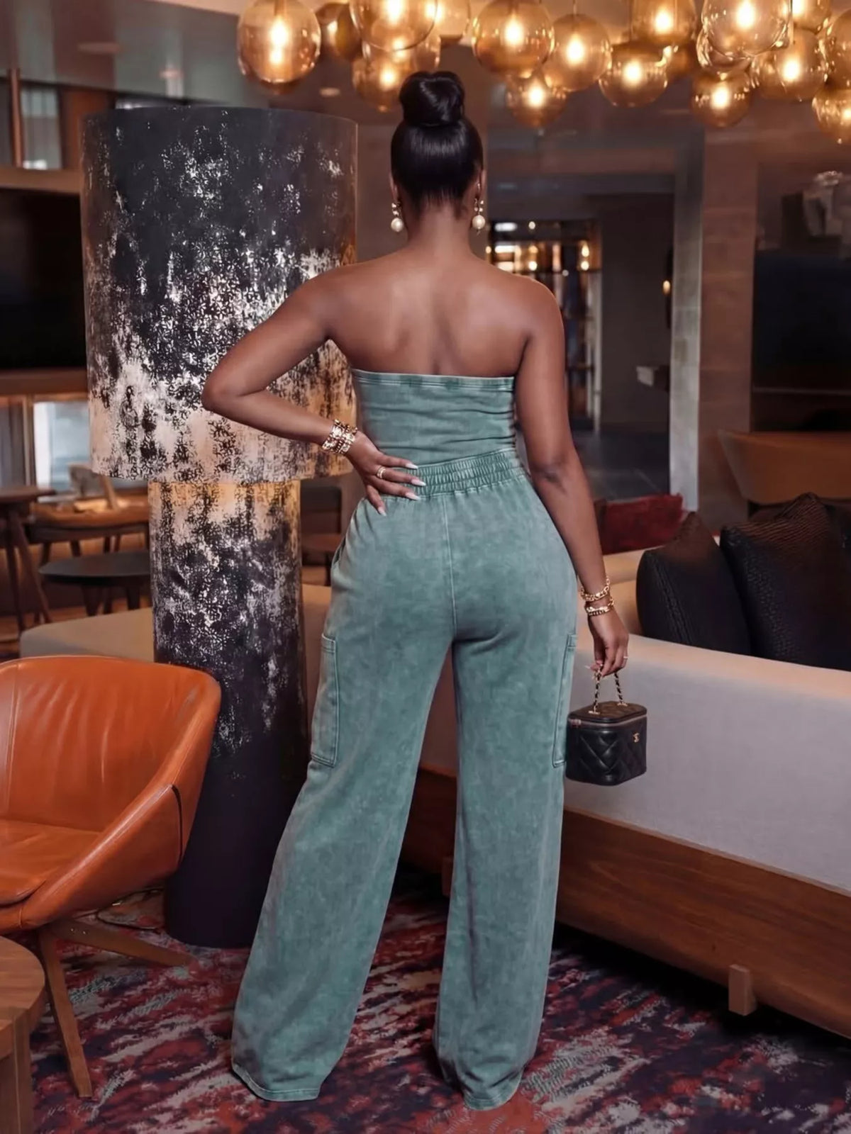 Plush Fashion Hub strapless wide-leg jumpsuit with drawstring waist, perfect for casual and summer wear, in a stylish playsuit design.