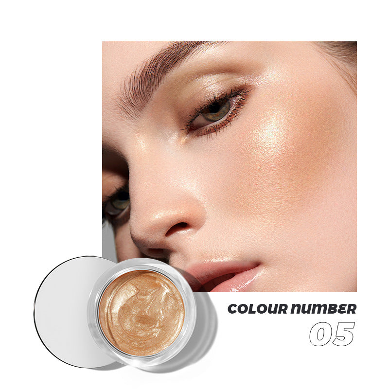 Gold highlighter in a clear round jar, paired with a close-up of a model wearing shimmering golden cheek makeup.