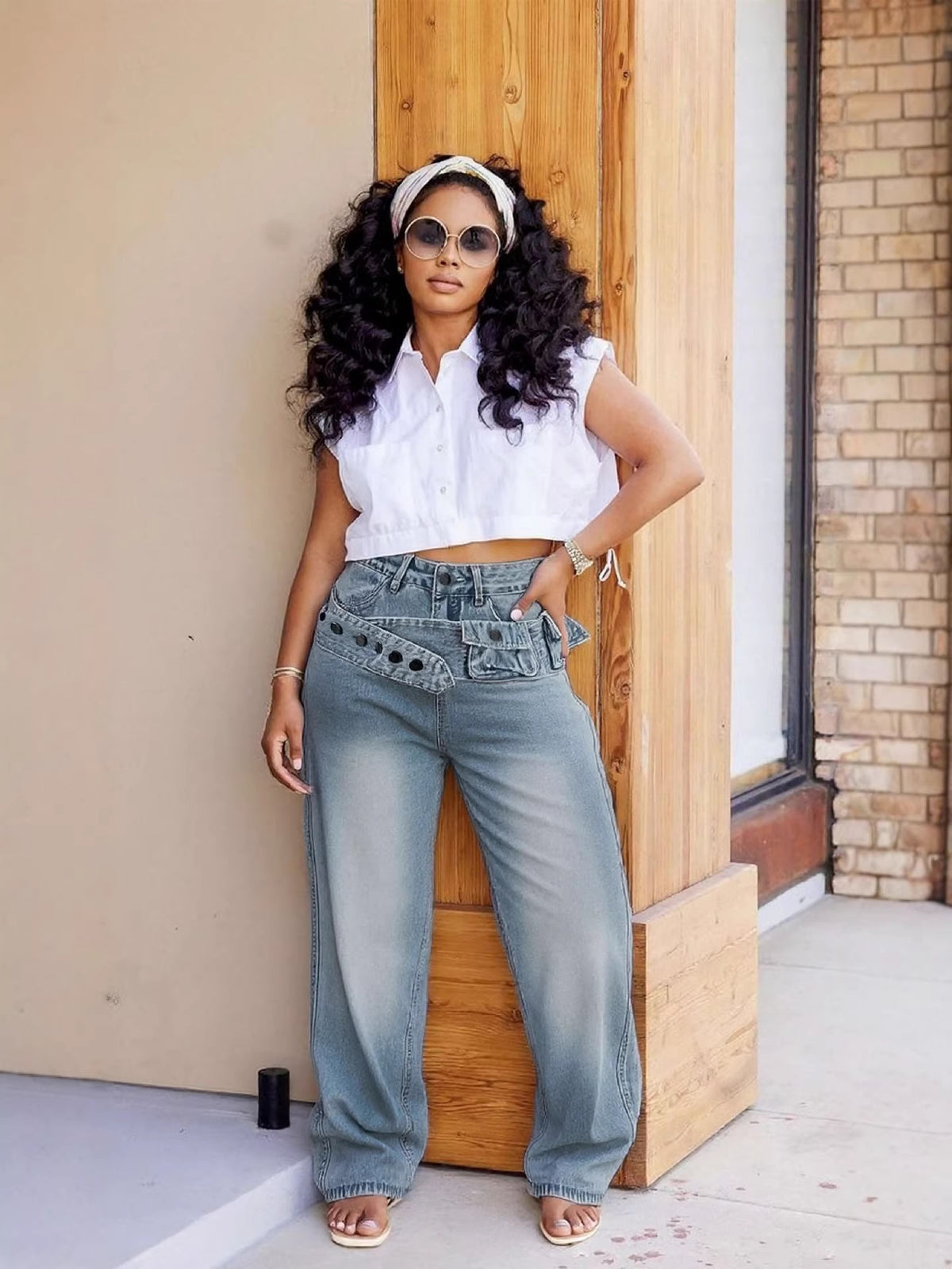 Eprolo street style distressed denim pants with multiple pockets and a belt, featuring washed, rugged denim design.
