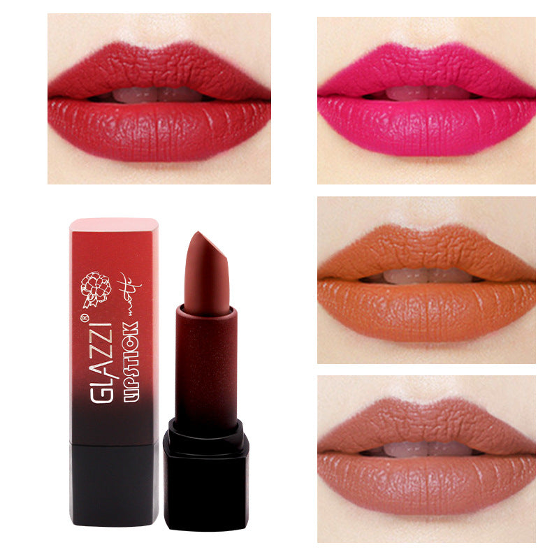 Matte lipstick in dark red with black gradient tube and four lip swatches in red, pink, orange, and nude.