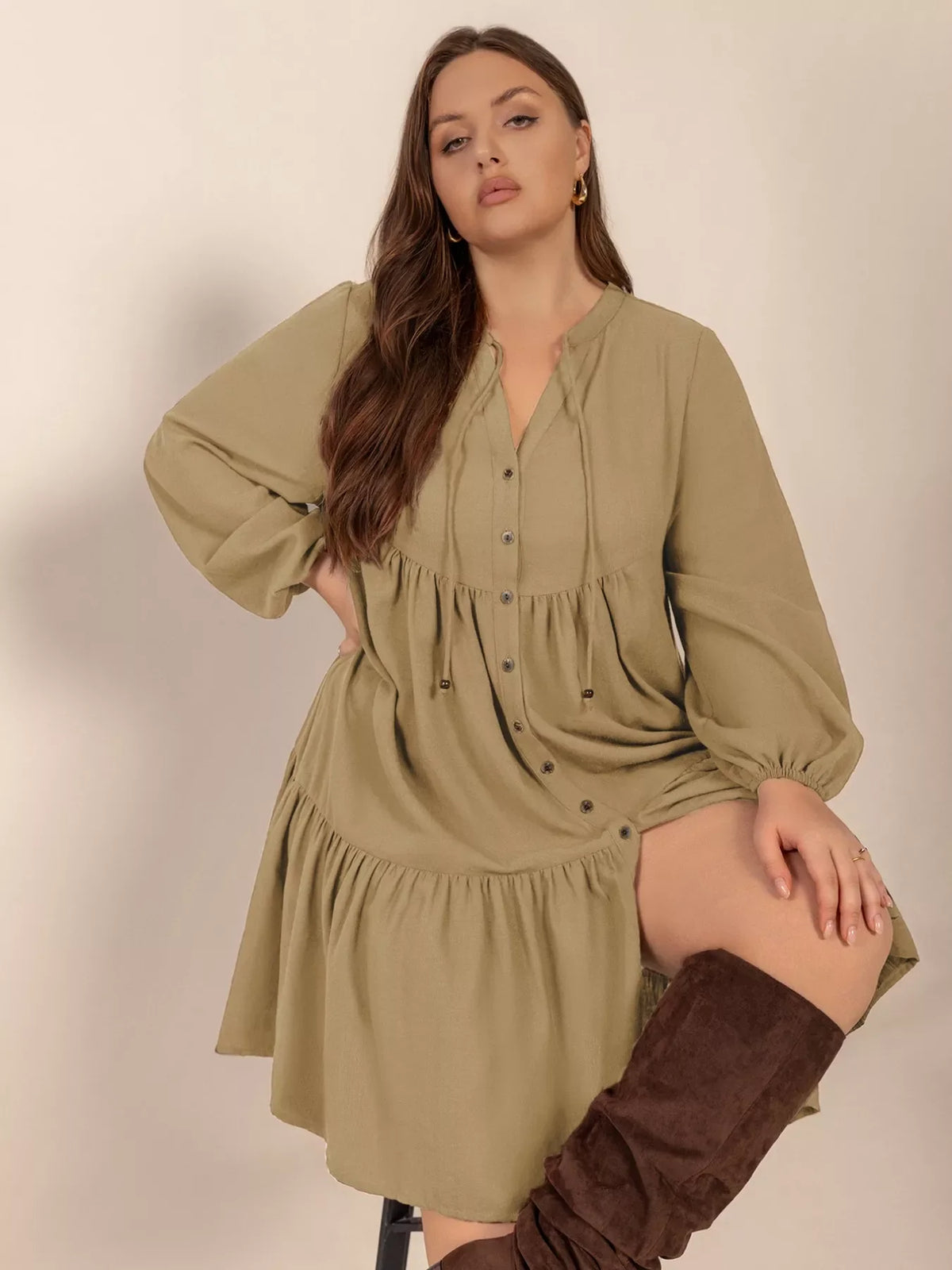 Plus size tie neck balloon sleeve dress by Plush Fashion Hub, featuring a stylish silhouette and elegant design.