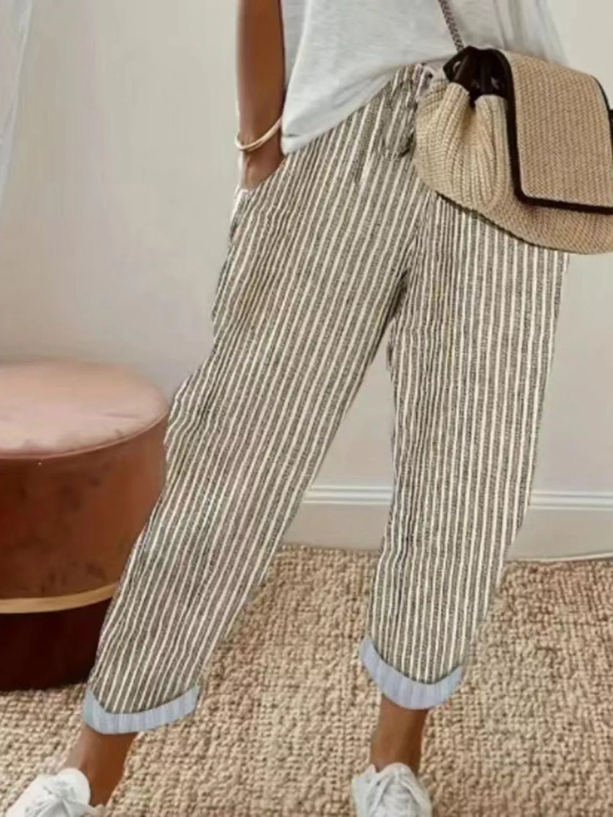Striped cropped pants by Plush Fashion Hub, showing a stylish design with horizontal stripes and a relaxed fit.