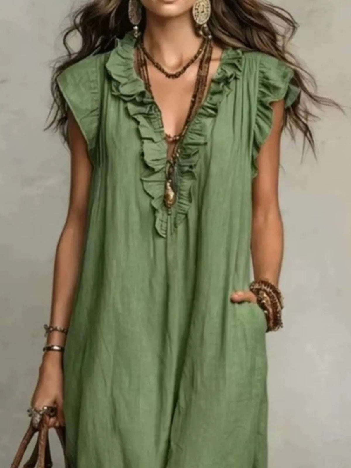 Plus size full length ruffled v-neck cap sleeve maxi dress by Plush Fashion Hub featuring flowing fabric and elegant ruffle details.