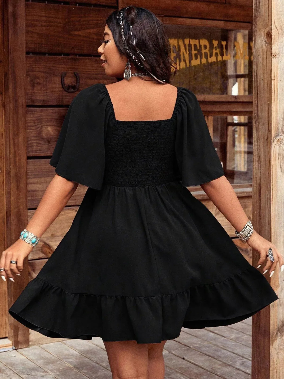 Embroidered Flutter Sleeve Mini Dress by Plush Fashion Hub featuring intricate embroidery and lightweight fabric.