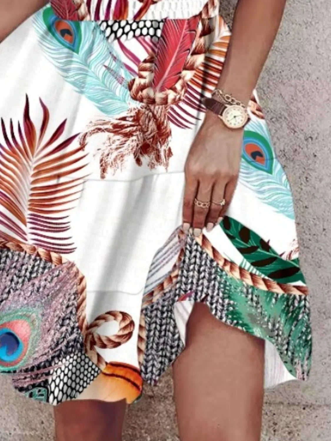 Paisley print halter neck mini dress by Plush Fashion Hub, featuring a stylish design with a fitted bodice and vibrant pattern.