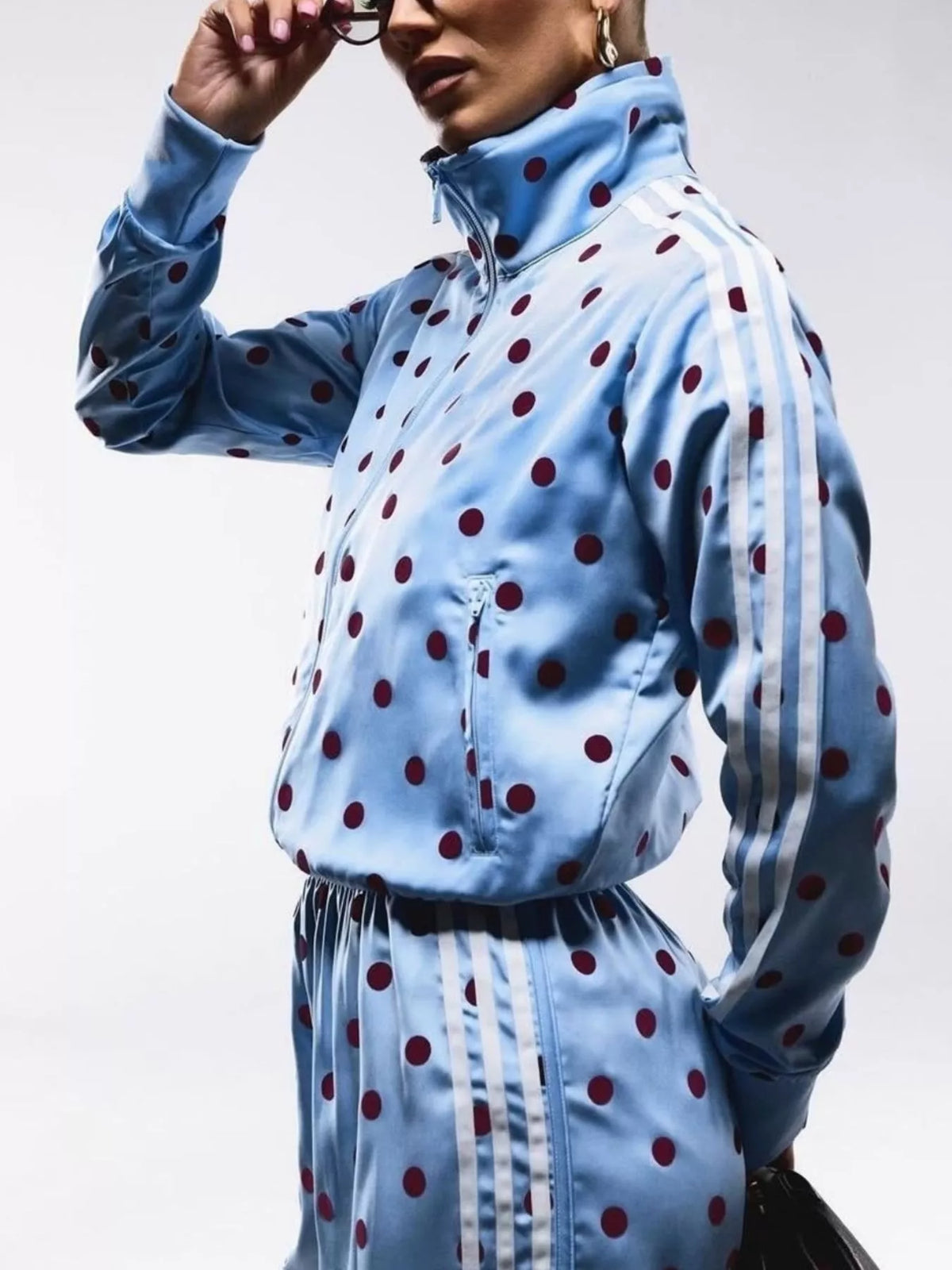 Plush Fashion Hub polka dot zip-up outerwear and matching pants set, stylish and comfortable clothing for casual wear.