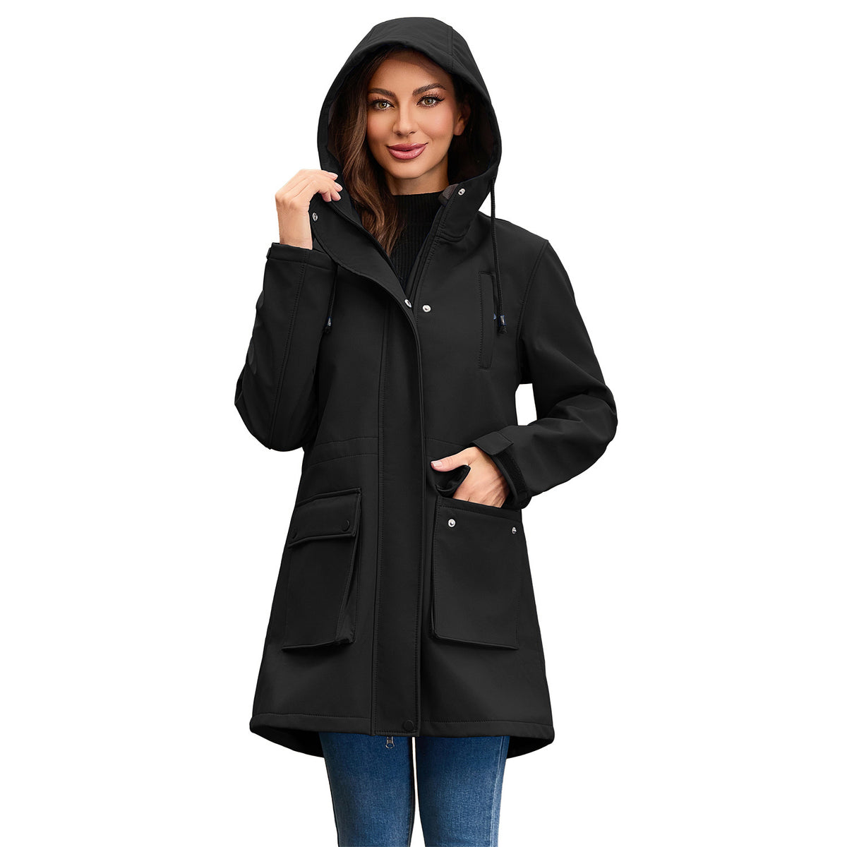 Woman wearing a solid black hooded jacket with large front flap pockets and snaps.