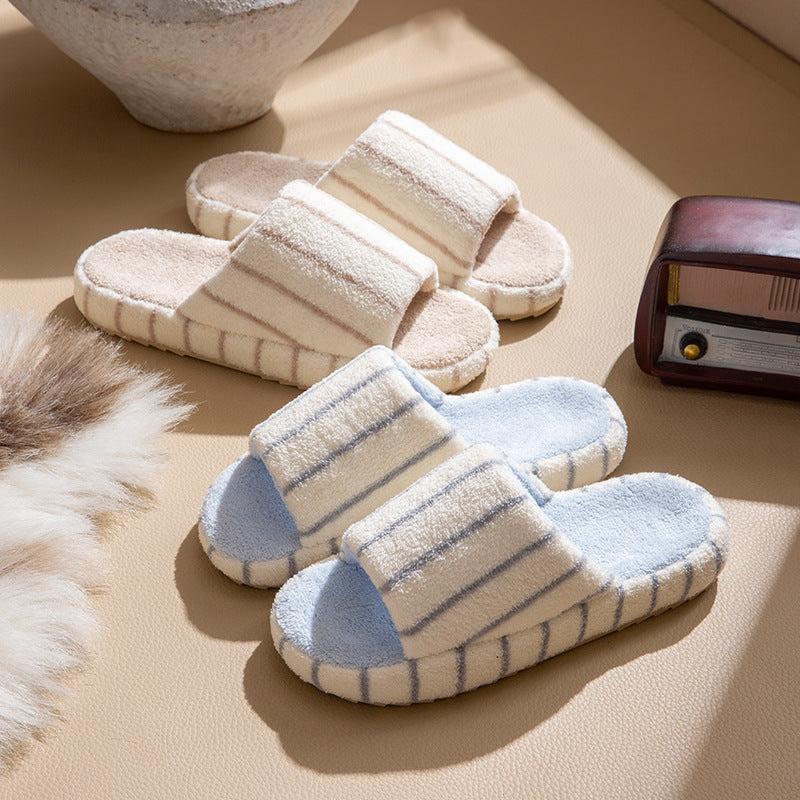 Unisex plush faux fur indoor slippers with anti-slip sole from Plush Fashion Hub, cozy and comfortable for home wear.