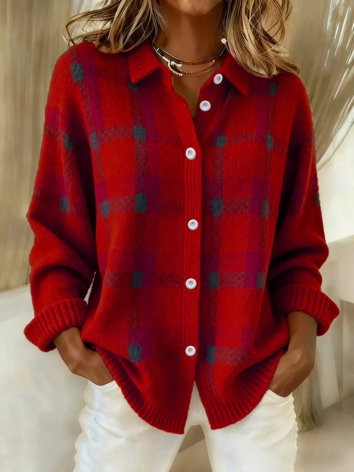 Plaid button-up cardigan by Trendsi featuring a classic pattern, long sleeves, and a cozy, stylish design.
