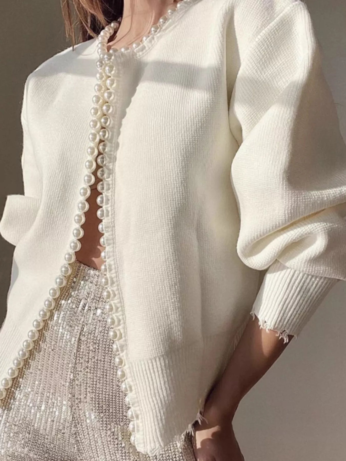 Pearl-trimmed open front women's cardigan by Trendsi, soft knit fabric with stylish pearl accents, perfect for casual or dressy wear.