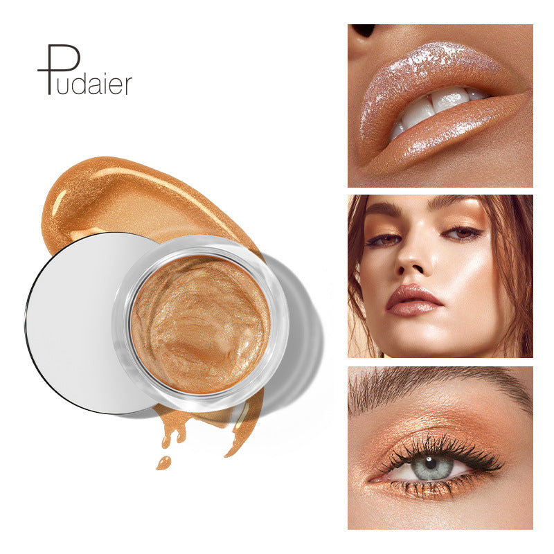 Pudaier metallic gold eyeshadow pot with glossy cream texture, next to lip, face and eye makeup swatches.