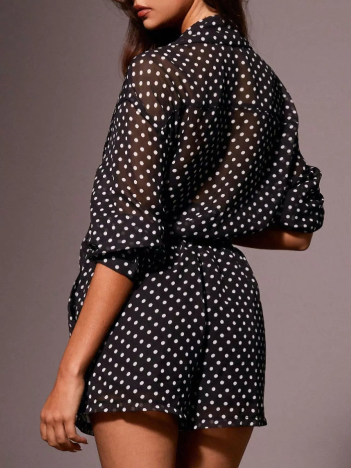 Polka dot button-up shirt and shorts loungewear set by Plush Fashion Hub, featuring a playful polka dot pattern and relaxed fit.