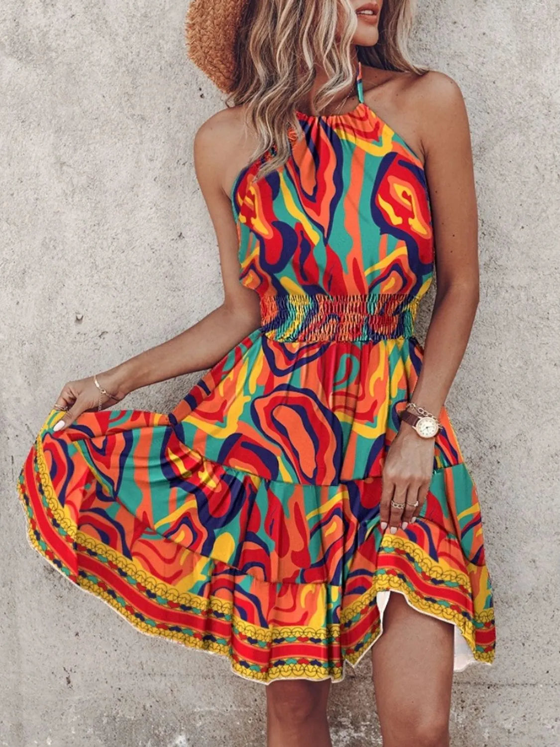 Paisley print halter neck mini dress by Plush Fashion Hub, shown in a stylish, fitted design with vibrant pattern and sleeveless style.