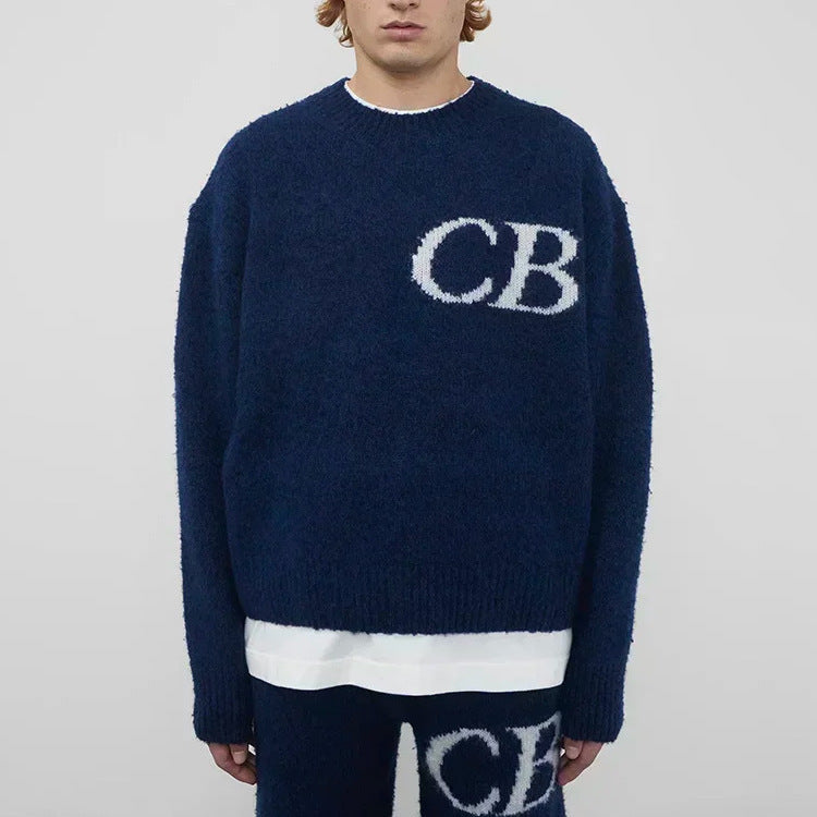 Unisex oversized CB letter knit crew neck sweater by Plush Fashion Hub, showing a cozy, casual knit sweater with bold letter details.