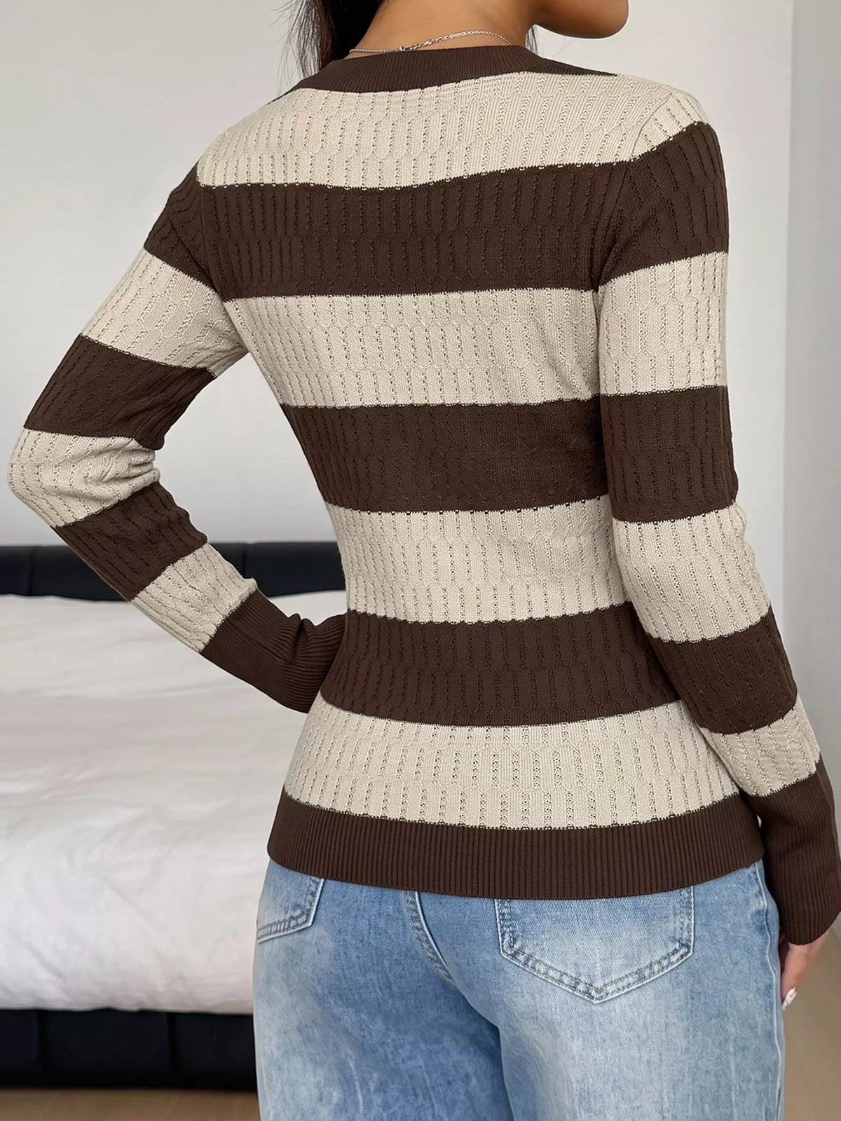 Striped V-neck knit top by Plush Fashion Hub featuring a casual, fitted design with multicolor horizontal stripes.