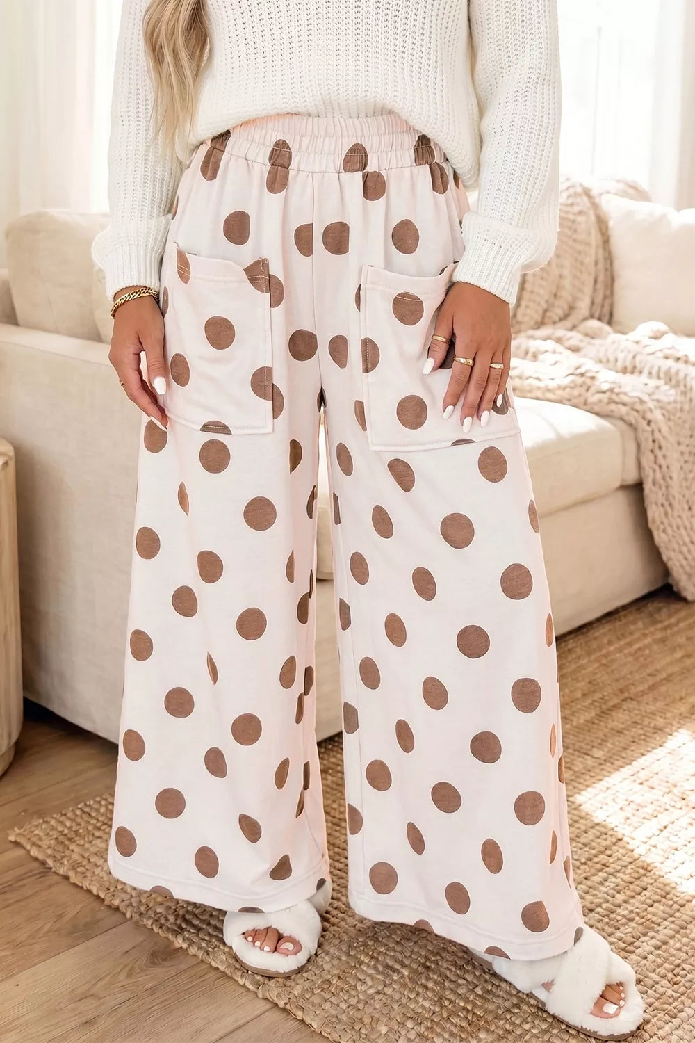 Polka dot wide leg casual pants with elastic waistband from Trendsi, featuring a relaxed fit and playful polka dot pattern.